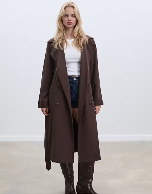 A long coat in brown, with a loose style and wide fit